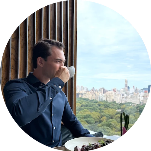Casey Russ, tea in hand, above Central Park